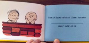 Charlie Brown and Linus looking sombre, atop of the thinking wall. Text: When I'm in my "depressed stance," you know BLANK always cheers me up.